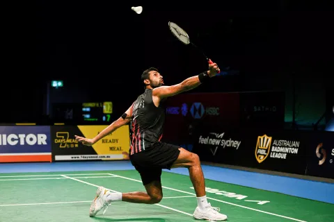 HS Prannoy hits a return against Priyanshu Rajawat in the semifinal