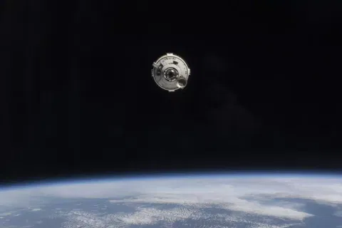 Boeing Starliner spacecraft with astronauts Butch Wilmore and Suni Williams aboard approaches the International Space Station on Thursday, June 6, 2024