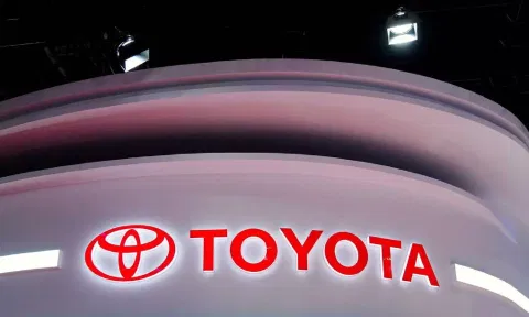 The Toyota logo is seen at its booth during a media day for the Auto Shanghai show in Shanghai.