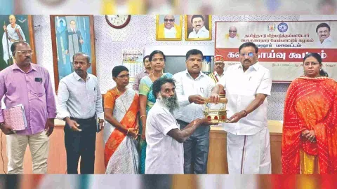 K Khaja Mohindeen, BCEDC chairman distributing welfare assistance in Vellore on Tuesday