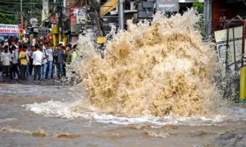 Cars were also spotted navigating through the flooded roads. (IANS)