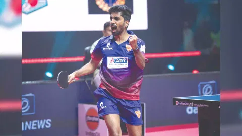 G Sathiyan lets out a roar after winning the match