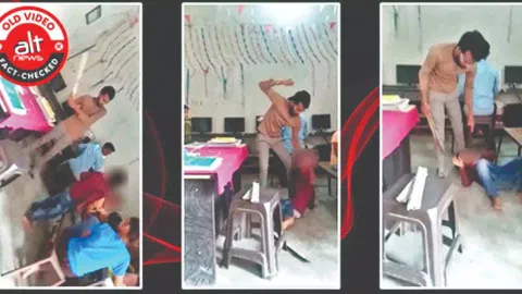 Teacher is seen thrashing a student with a stick