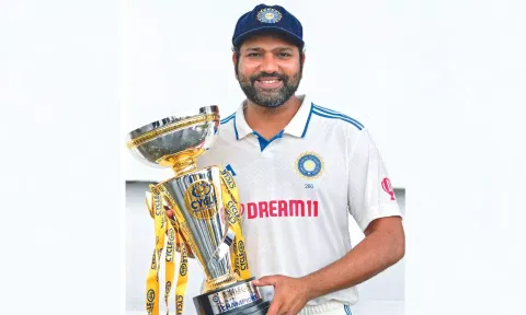 Rohit Sharma holds the trophy