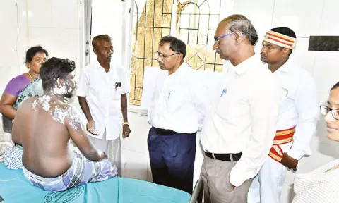 Mayiladuthurai Collector AP Mahabharathi consoling the fire accident victims on Saturday
