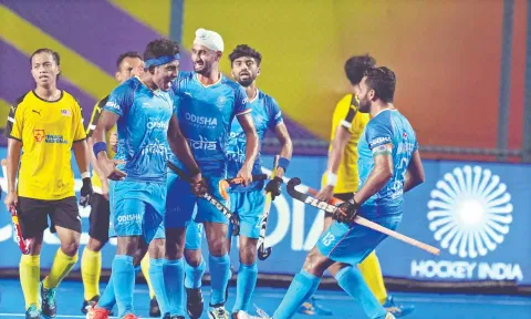 Karthi Selvam celebrates after scoring India’s first goal.