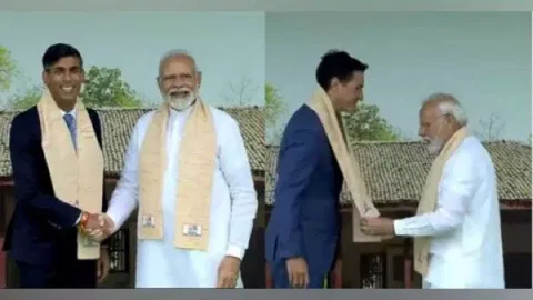 Prime Minister Narendra Modi welcomes UK PM Rishi Sunak and Canadian PM Justin Trudeau at Rajghat in New Delhi on Sunday. (Photo/ANI)
