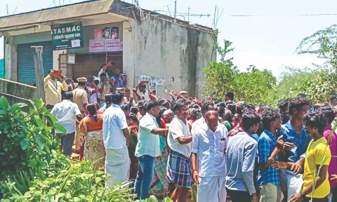 Residents stage protest seeking relocation of Tasmac outlet at Irumulai in Thanjavur district on Wednesday