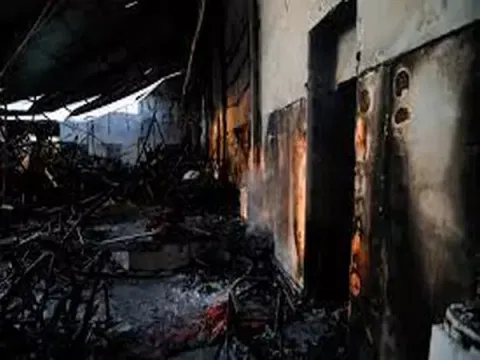 A view of a site following a fatal fire at a wedding celebration