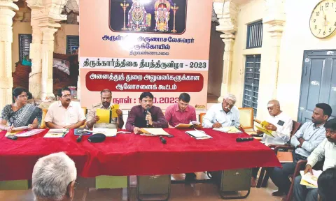 Collector B Murugesh presiding the meeting to review preparations for Karthigai Deepam festival in Tiruvannamalai on Wednesday.