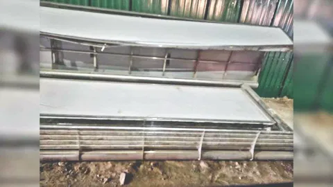 Collapsed bus shelter on EVR Periyar Salai in Egmore