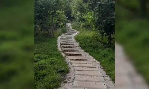 Concrete stairs have replaced boulder steps at Madakulam in Madurai