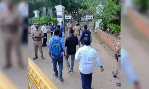 NIA officials outside Raj Bhavan on Saturday