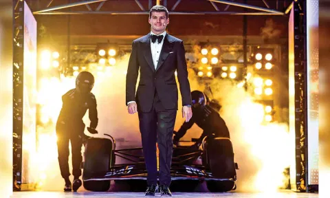 Max Verstappen gets introduced onstage at the FIA awards