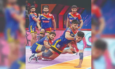 UP Yoddhas players in action against Jaipur Pink Panthers.