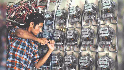 File photo of a Tangedco worker repairing a meter in the city