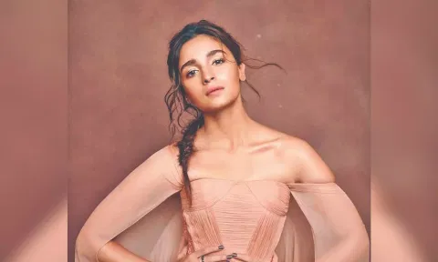 Alia Bhatt in peach colour dress