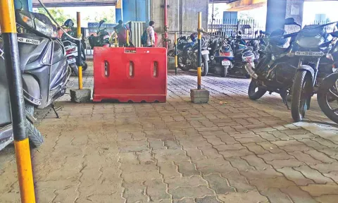 Pathway at Koyambedu Metro station blocked with barricade and rope