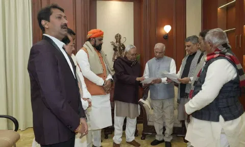 Acting CM Nitish Kumar, leaders of JD(U), BJP, HAM, and an Independent MLA meet Governor Rajendra Arlekar. (ANI)