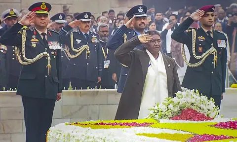 President Droupadi Murmu pays homage to Mahatma Gandhi at Rajghat on Martyrs' Day observed to mark the death anniversary of the father of the nation in New Delhi on Tuesday. (PTI)