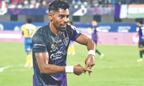 Odisha's Roy Krishna celebrates scoring a goal