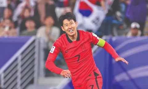 Son Heung-min celebrates after scoring the winner for South Korea