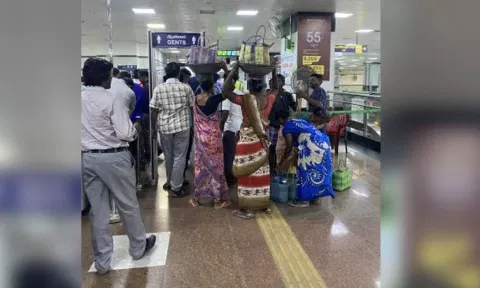 A group of construction workers gathered at Central Metro station with different equipment to travel to Nandanam on Tuesday morning. (File)