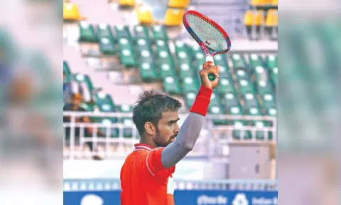 Sumit Nagal acknowledges the crowd after his win