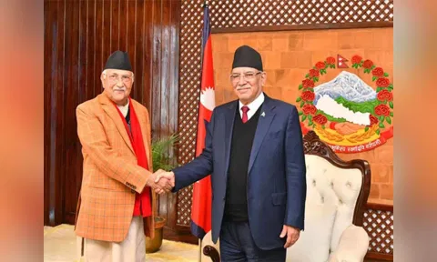 CPN-UML Chairman KP Sharma Oli (Left) and Nepal PM Pushpa Kamal Dahal (Right) shake hands before the start of the new coalition meeting on Monday. ANI