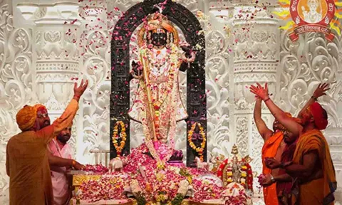 Priests showers flowers on Ram Lalla idol and played Holi (ANI) 