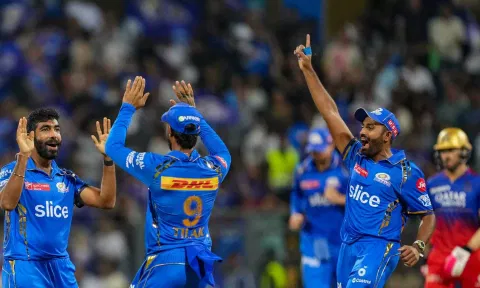 Mumbai Indians players celebrates after a wicket (PTI)