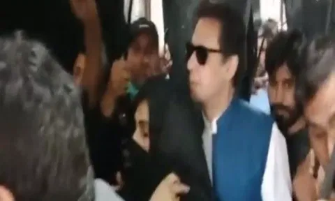 PTI founder Imran Khan with his wife Bushra Bibi (ANI)
