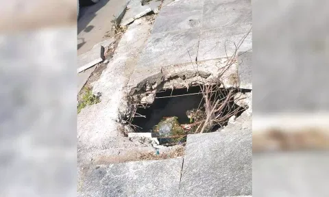The damaged pathway on the road near Madhya Kailash