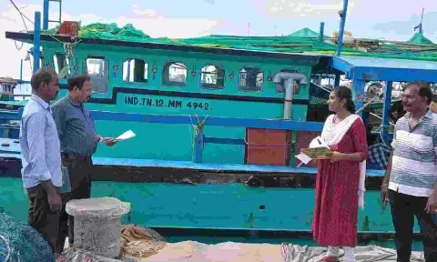 Fisheries Department officials inspecting mechanised boats anchored in Thoothukudi harbour on Tuesday 