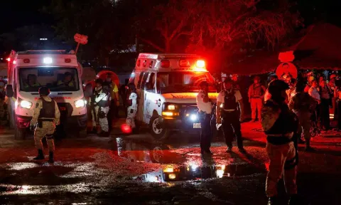 Soldiers stand near ambulances after a gust of wind caused a structure to collapse, resulting in multiple fatalities and injuries, at a campaign event for the Citizens' Movement party, in San Pedro Garza Garcia, Nuevo Leon, Mexico.(Image Credit: Reuters) 