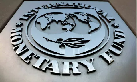 The International Monetary Fund (IMF) logo is seen outside the headquarters building in Washington, U.S. (Reuters) 