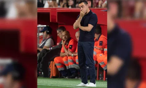  Xavi on the touchline during Barcelona's final league match