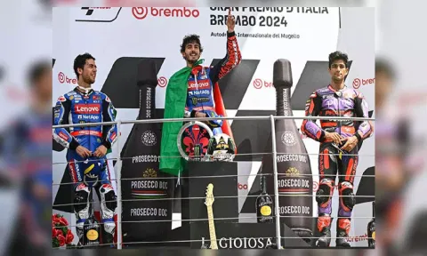 Ducati Lenovo Team's Francesco Bagnaia (In Centre) at podium after winning Italian MotoGP (ANI)