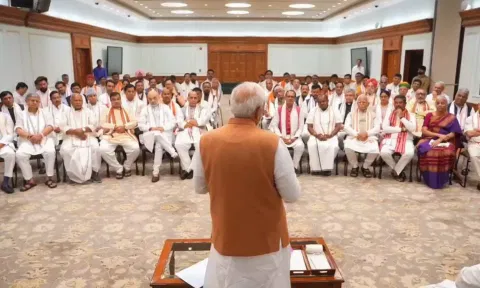  Prime Minister-designate Narendra Modi with NDA leaders during an interaction over tea (PTI)