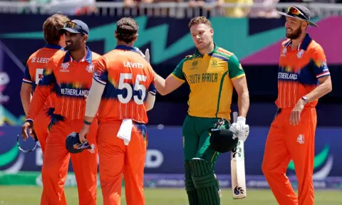David Miller shakes hands with Michael Levitt of the Netherlands (PTI)