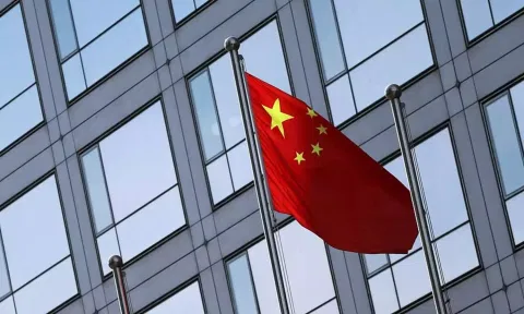 A Chinese flag flutters outside the China Securities Regulatory Commission building
Read more at: https://www.deccanherald.com/world/chinese-communist-partys-former-tibet-chief-under-investigation-for-corruption-3069835