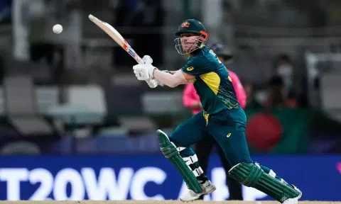 David Warner plays a shot in the match against Bangladesh (PTI)