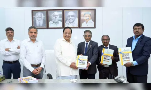 Retired Justice P Jyothimani submitting the report to Minister Duraimurugan at Secretariat on Wednesday