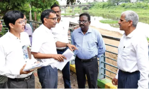GCC officials and CS Shiv Das Meena inspecting desilting works in Adyar river on Saturday