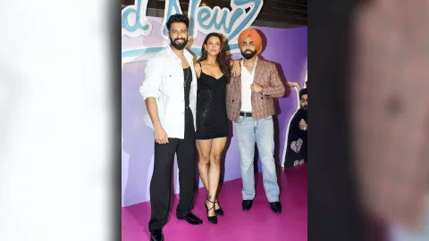 (L-R) Actors Vicky Kaushal, Tripti Dimri and Ammy Virk pose for photos during the trailer launch of their upcoming film 'Bad Newz' (Photo/PTI)