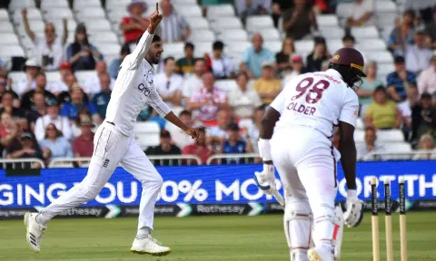 England's Shoaib Bashir, left, celebrates after dismissing after West Indies Jason Holder (PTI) 