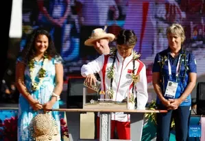 Surfing athletes celebrate opening ceremony in Tahiti