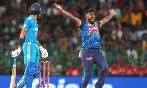 Sri Lanka's Charith Asalanka takes the catch of India's Axar Patel during the second ODI cricket match 
