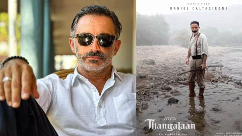 Daniel Caltagirone and his poster from the film Thangalaan 