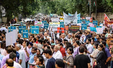 Doctors stage a protest march amid the 24-hour nationwide strike called by the Indian Medical Association (IMA) demanding justice for the woman doctor